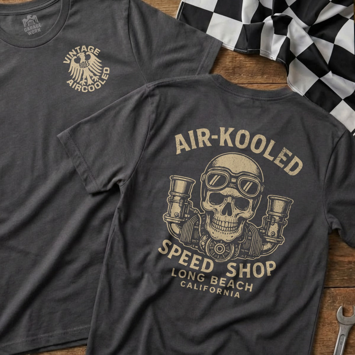 Dark grey t-shirt with a distressed skull and goggles graphic, "Air-Kooled Speed Shop" and "Long Beach California" text.