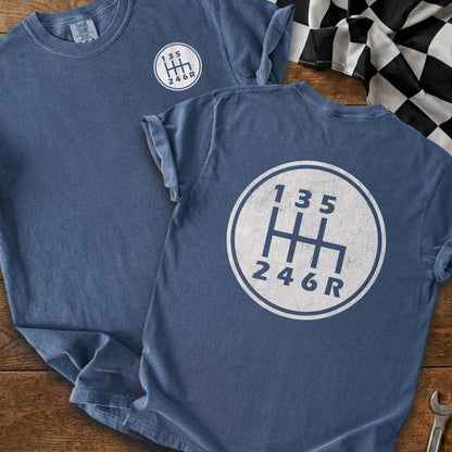 Blue t-shirts with white manual transmission shift pattern graphic.