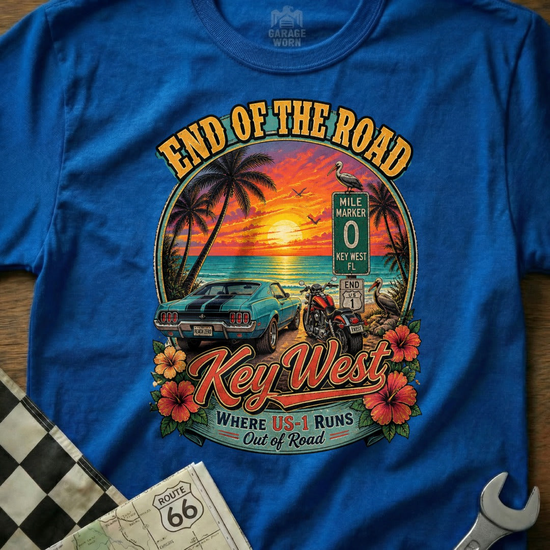 Key West t-shirt design with classic car, motorcycle, and sunset over ocean.