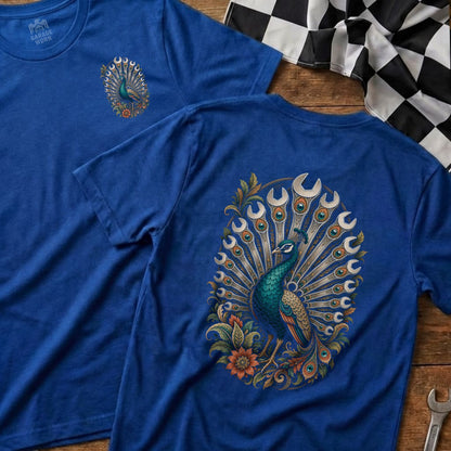 Blue t-shirt with peacock graphic made of wrenches and gears.