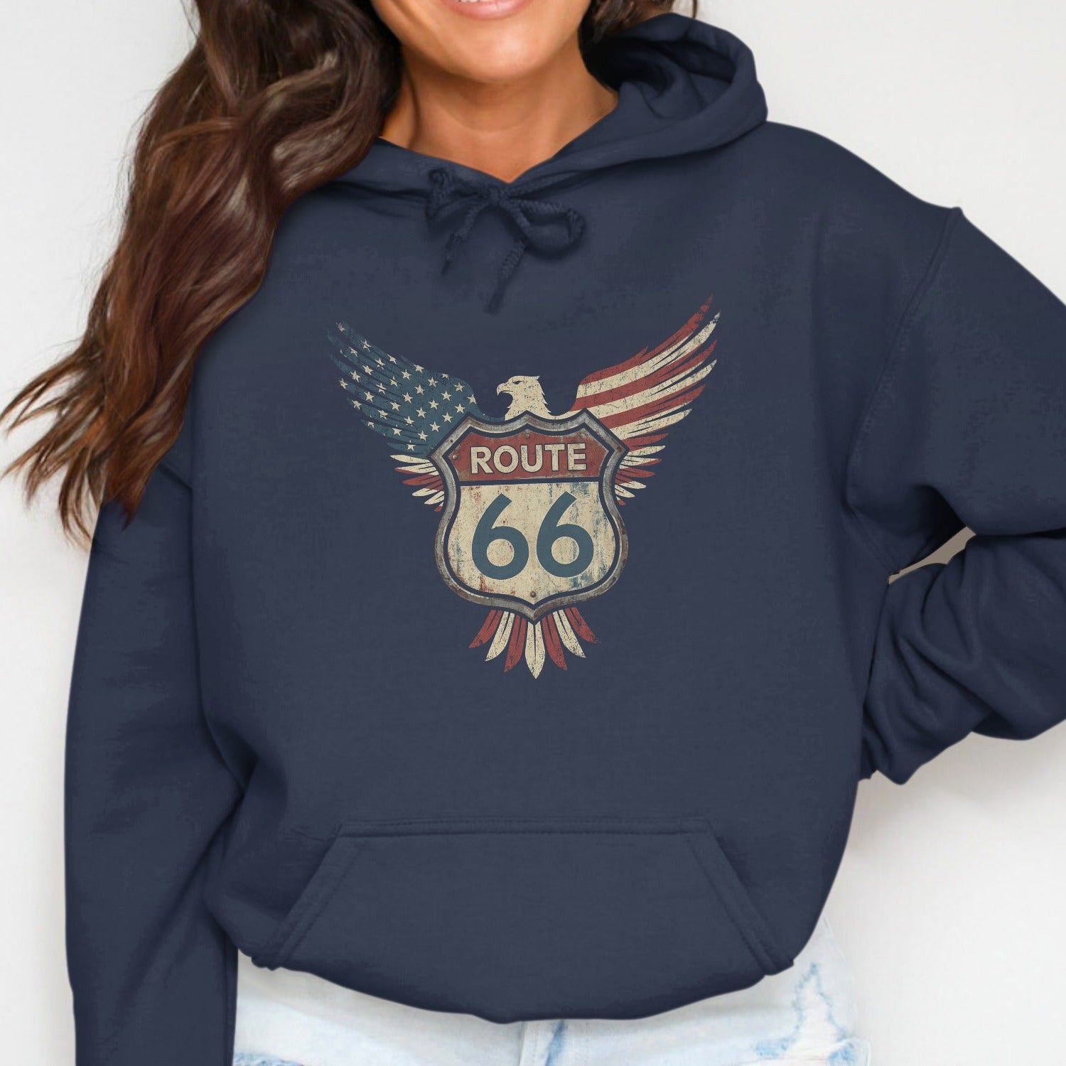 Navy hoodie with Route 66 eagle logo, American flag wings, on a woman.