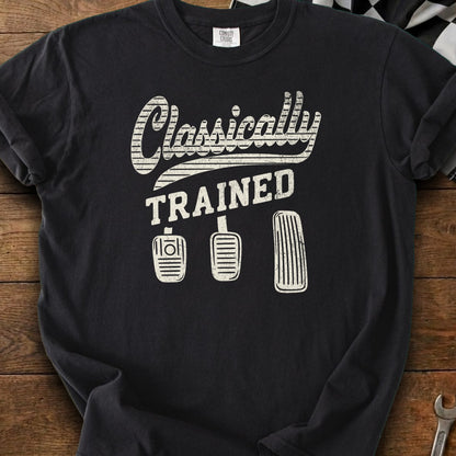 Black t-shirt with "Classically TRAINED" text and three car pedals.
