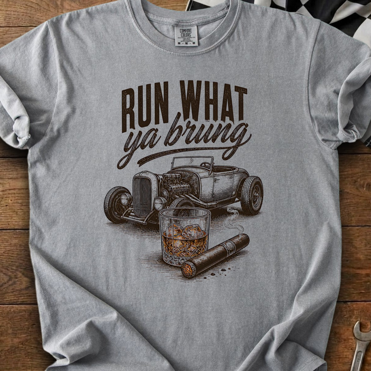 T-shirt with hot rod, whiskey, and cigar graphic; text reads "Run what ya brung."