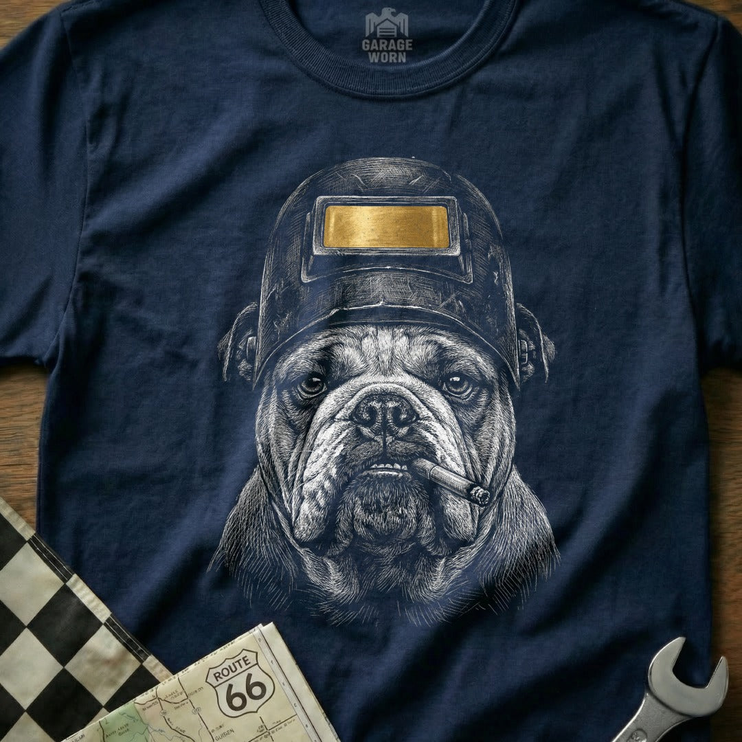 Bulldog wearing a welding mask and holding a cigar, with Route 66 map and wrench.