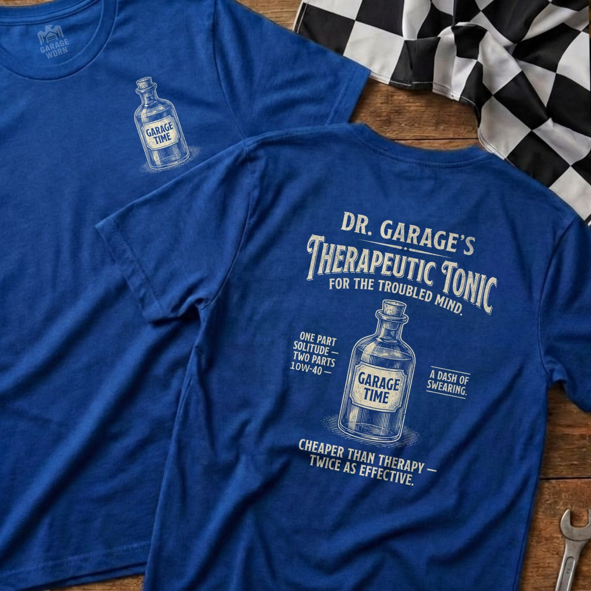 Blue t-shirt with "Dr. Garage's Therapeutic Tonic" design.