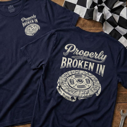Navy t-shirt with "Properly Broken In" text and clutch disc graphic.