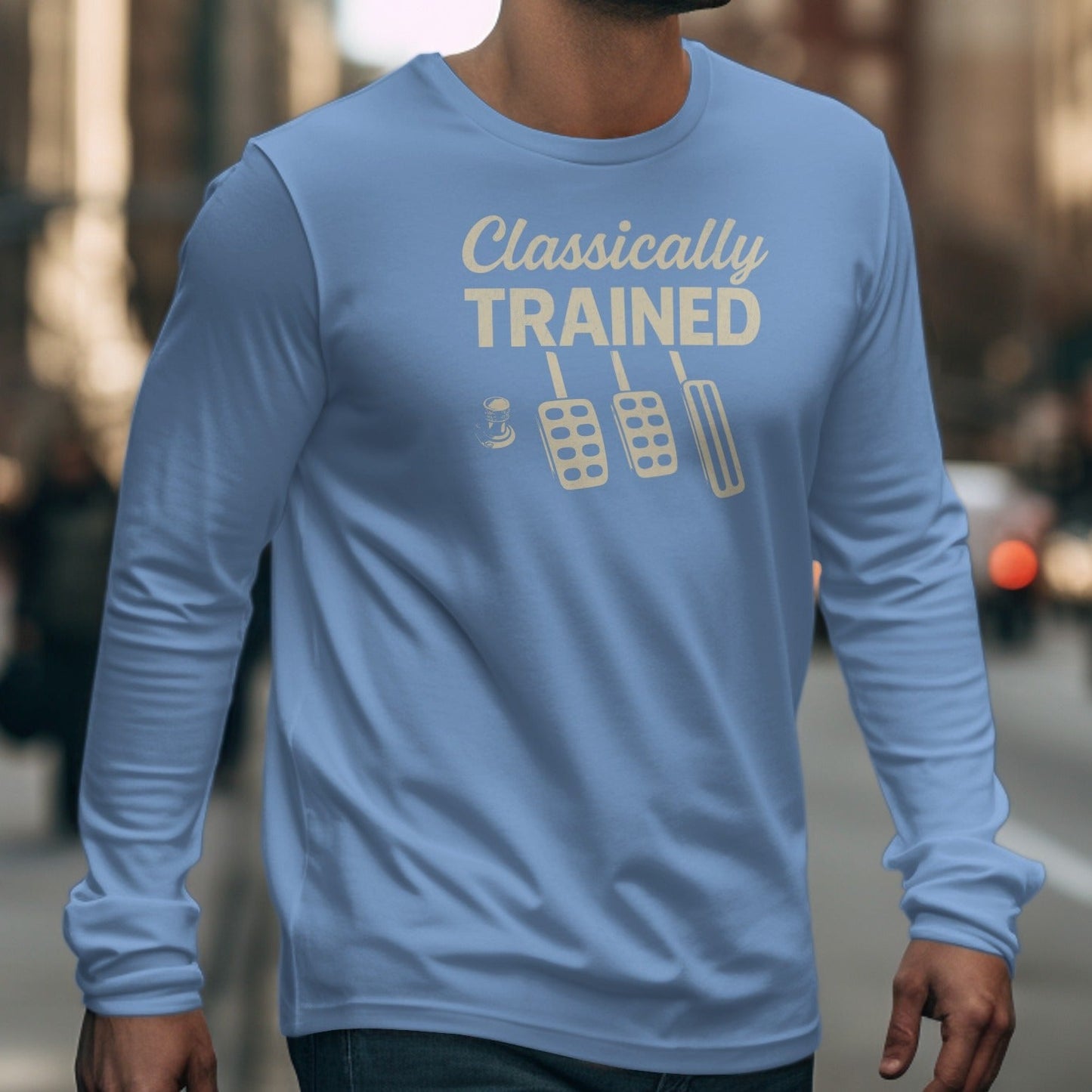 Light blue long sleeve shirt with "Classically TRAINED" text and pedal graphic.