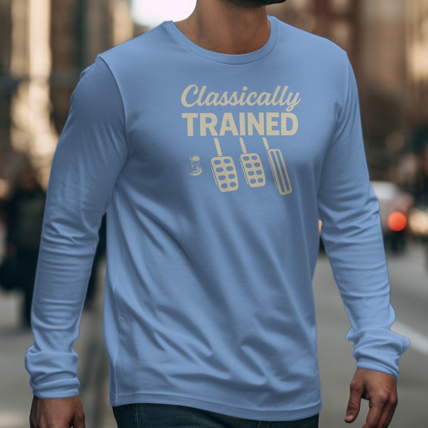 Light blue long sleeve shirt with "Classically TRAINED" text and pedal graphic.