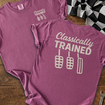 T-shirt with "Classically TRAINED" text and triple pedal graphic.