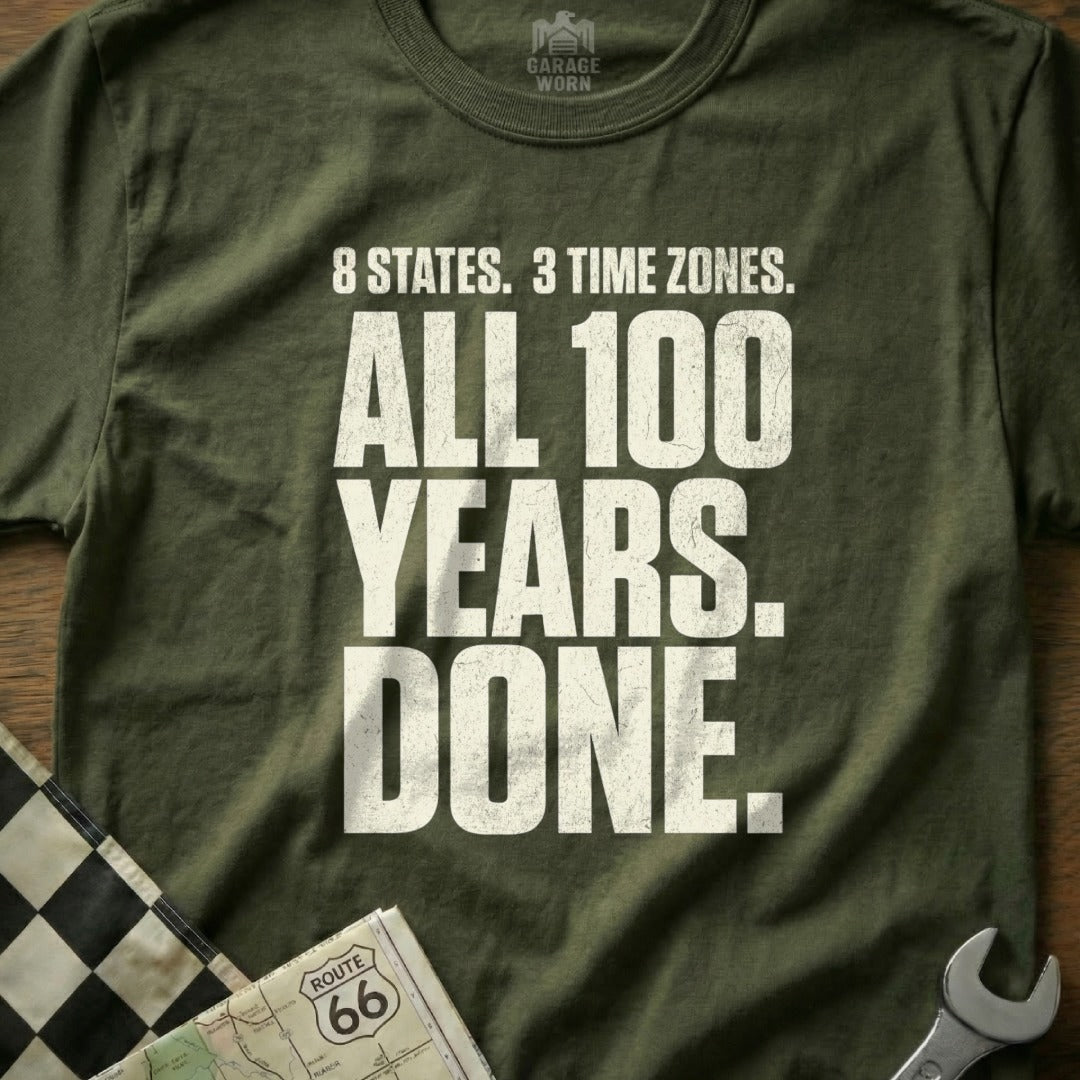 Olive t-shirt with "8 STATES. 3 TIME ZONES. ALL 100 YEARS. DONE." text.