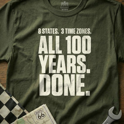 Olive t-shirt with "8 STATES. 3 TIME ZONES. ALL 100 YEARS. DONE." text.