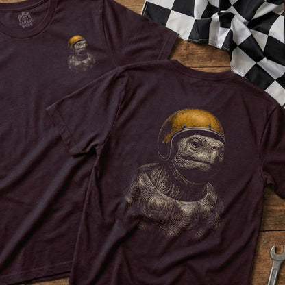 T-shirt with illustration of a tortoise wearing a yellow helmet and racing gear.