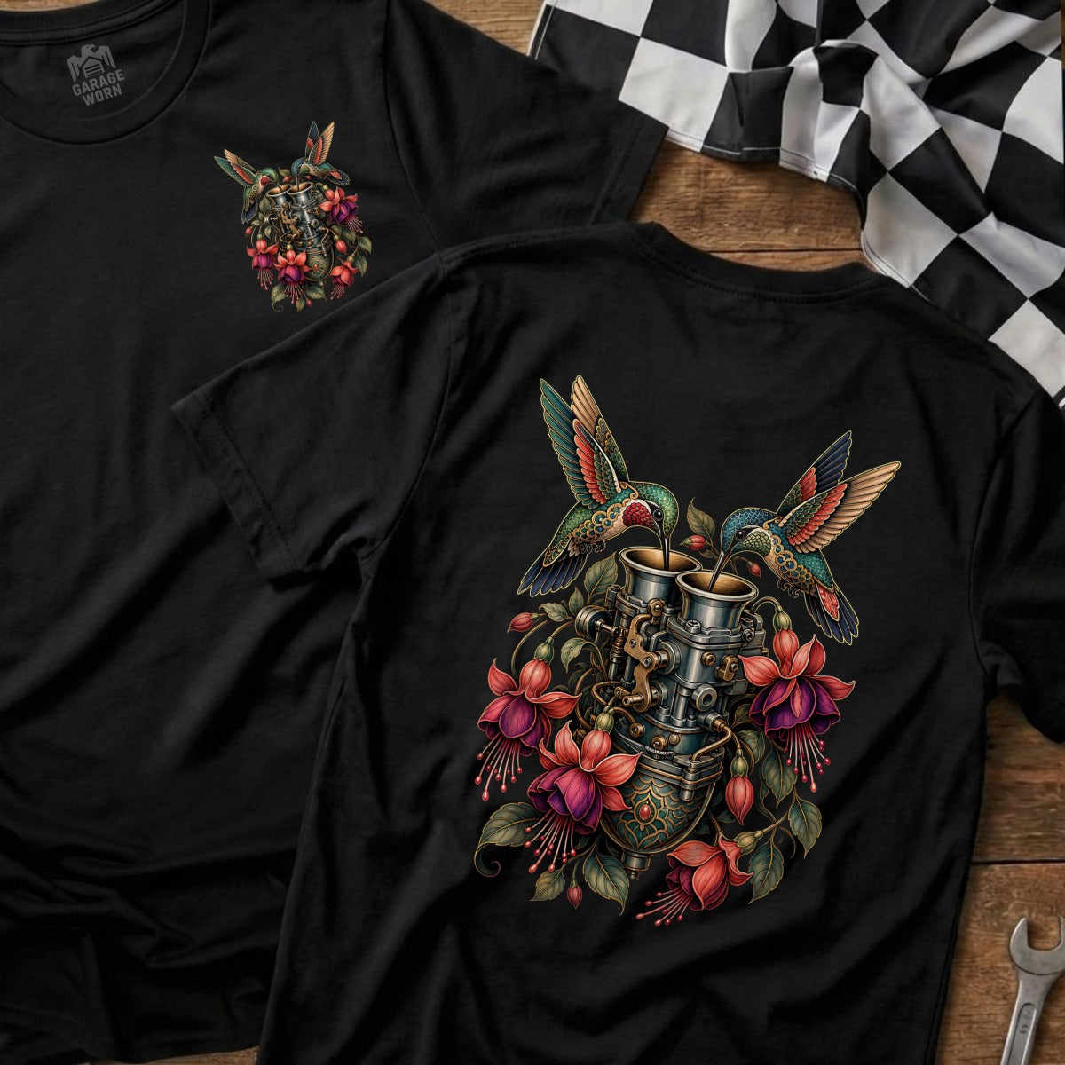 Black t-shirt with two hummingbirds feeding on a carburetor surrounded by fuchsia flowers.