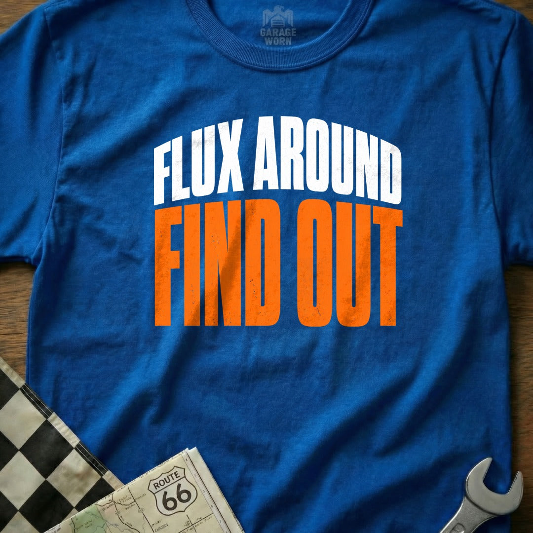 Blue t-shirt with white and orange text reading "FLUX AROUND FIND OUT".