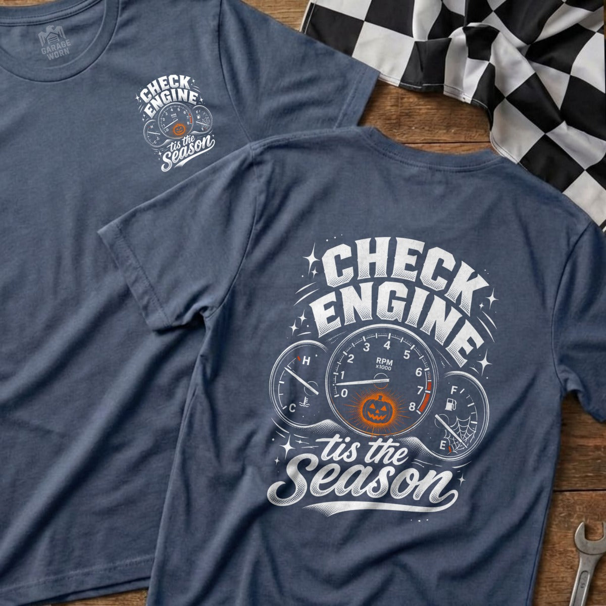 Blue t-shirt with "Check Engine 'tis the Season" Halloween graphic on back.