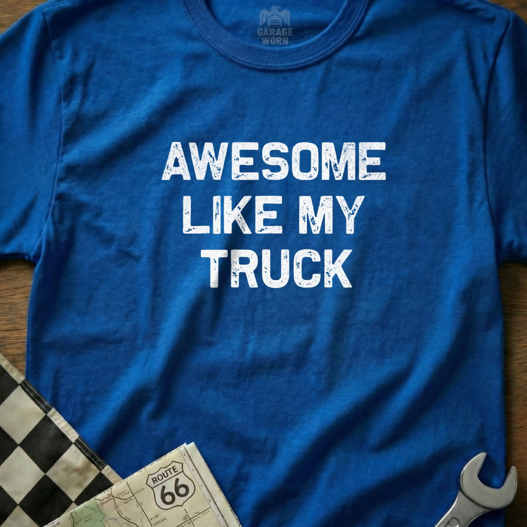 Blue t-shirt with "AWESOME LIKE MY TRUCK" printed in white, superimposed over a checkered flag and map.