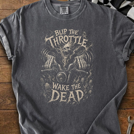 Distressed graphic t-shirt with "Blip The Throttle Wake The Dead" text and skull illustration.