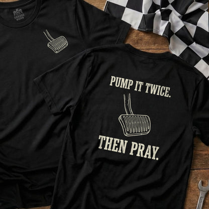 Black t-shirt with gas pedal graphic and text "Pump it twice. Then pray."