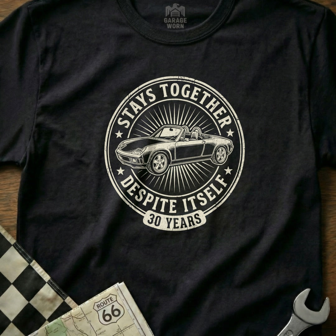 Black t-shirt with circular graphic: "Stays Together Despite Itself 30 Years" and a convertible car.