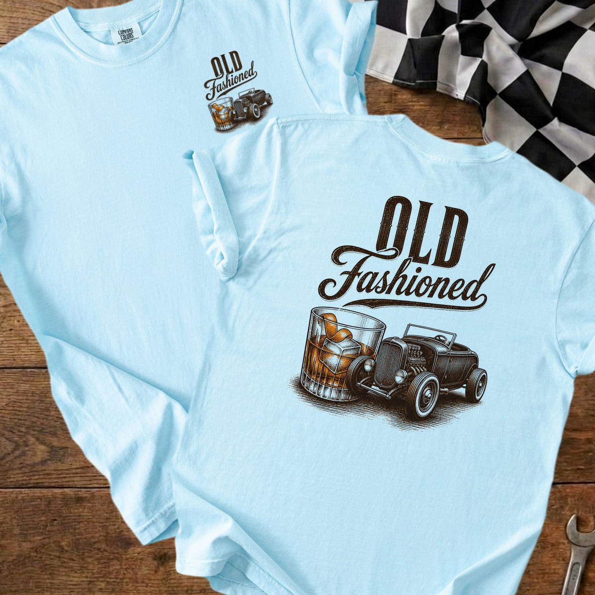 Light blue t-shirt with "Old Fashioned" text, whiskey glass, and hot rod image.
