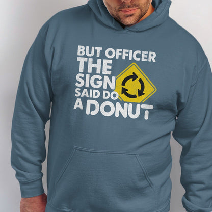 Blue hoodie with white text "BUT OFFICER THE SIGN SAID DO A DONUT" and roundabout sign.