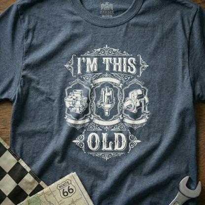T-shirt with "I'm This Old" text and vintage engine parts illustration.