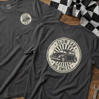 Dark t-shirt with "Slow Car, Big Smiles" and a vintage Beetle.