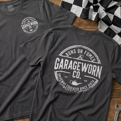 Charcoal t-shirt with "GarageWorn Co. Runs on Fumes Driveway Educated Since Birth" circular logo.