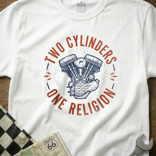 White t-shirt with "Two Cylinders, One Religion" and motorcycle engine graphic.