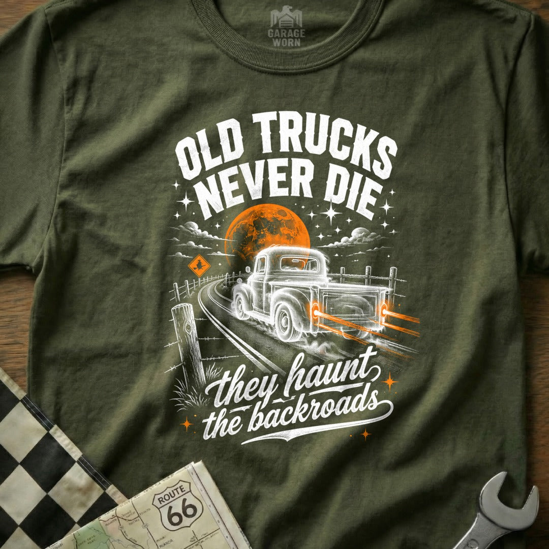 Olive green t-shirt with "OLD TRUCKS NEVER DIE they haunt the backroads" text and illustration.
