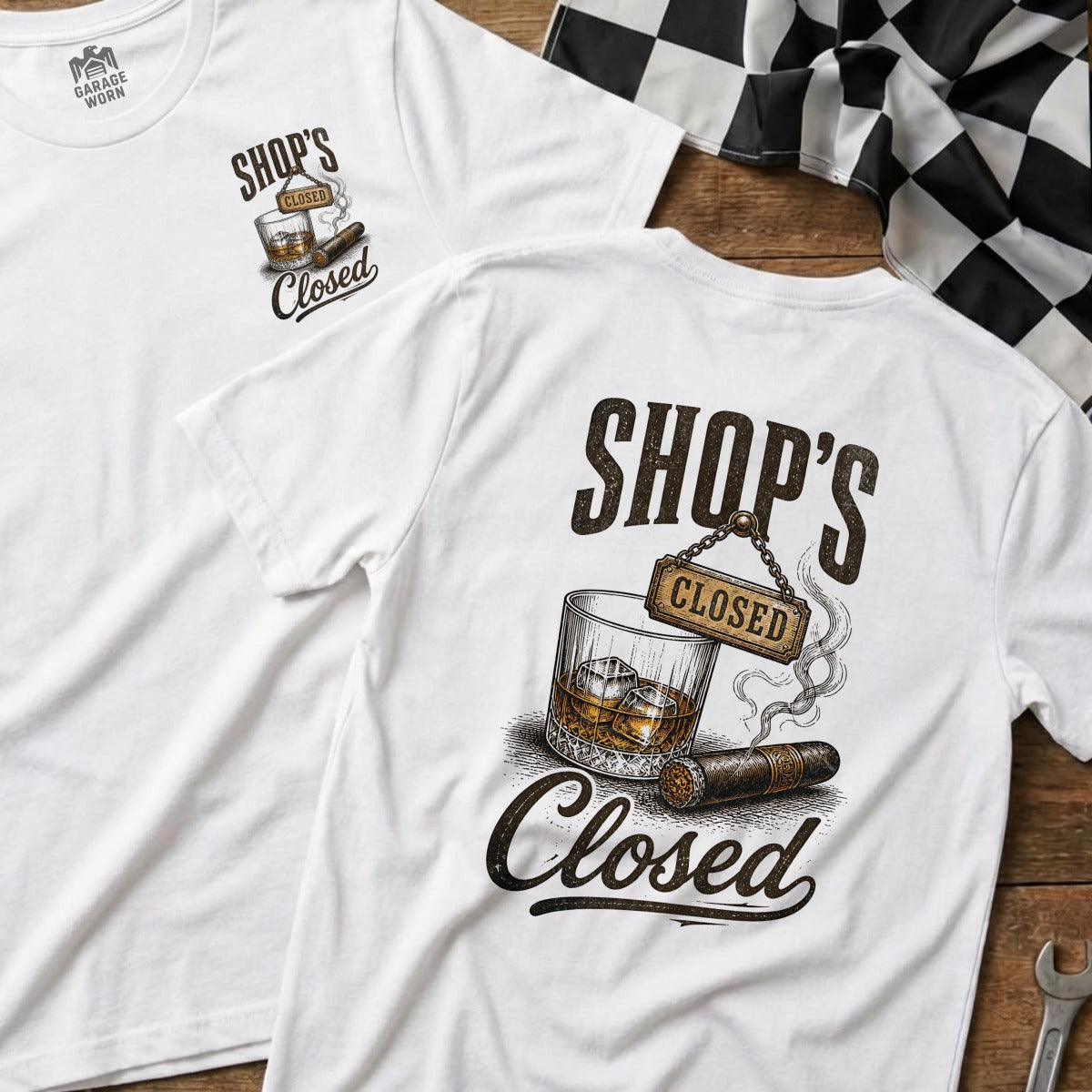 White t-shirt with "Shop's Closed" text, whiskey glass, and cigar graphic.