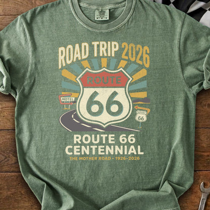 Green t-shirt with "Road Trip 2026 Route 66 Centennial The Mother Road" graphic.