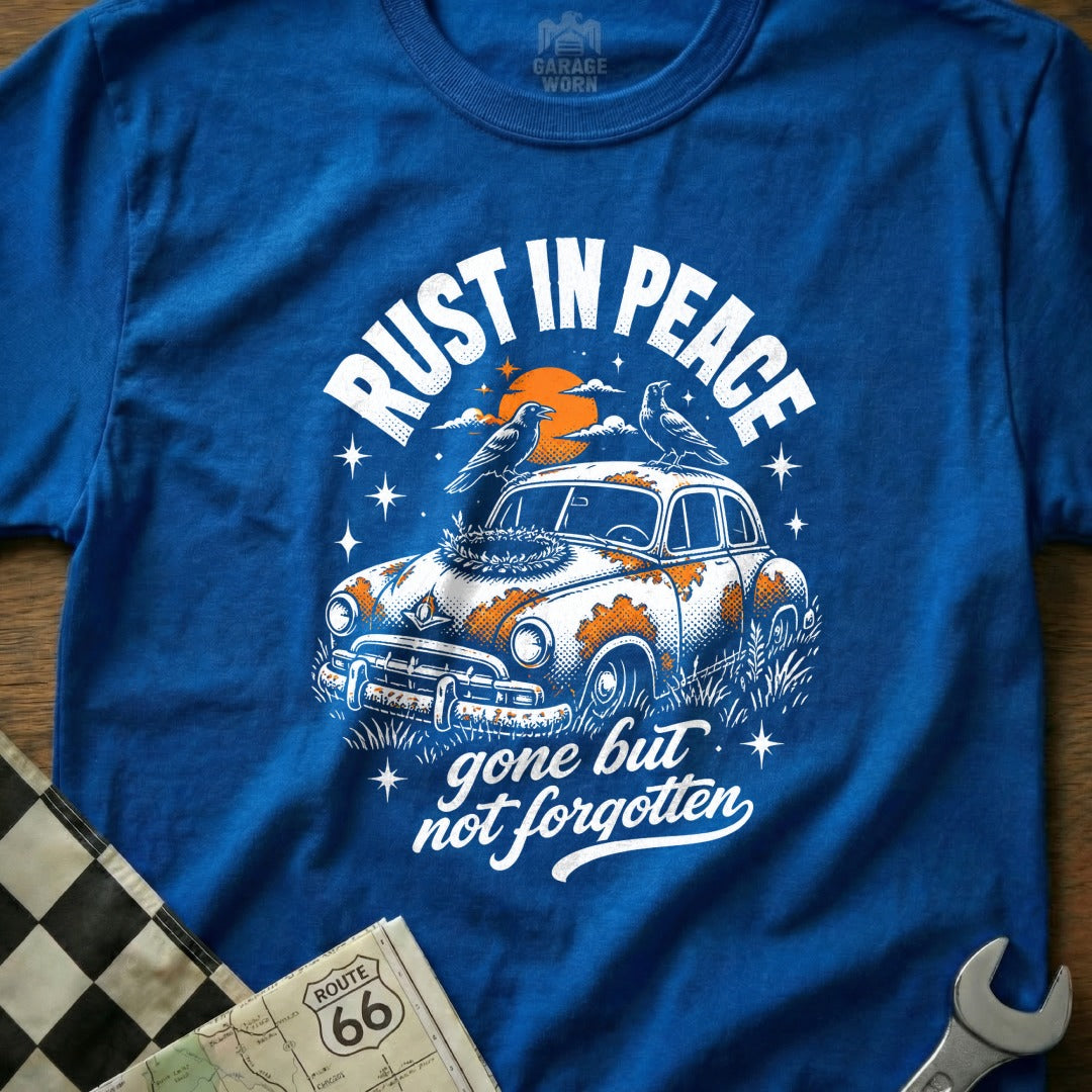 T-shirt graphic: rusted car with "Rust in Peace" and "gone but not forgotten."