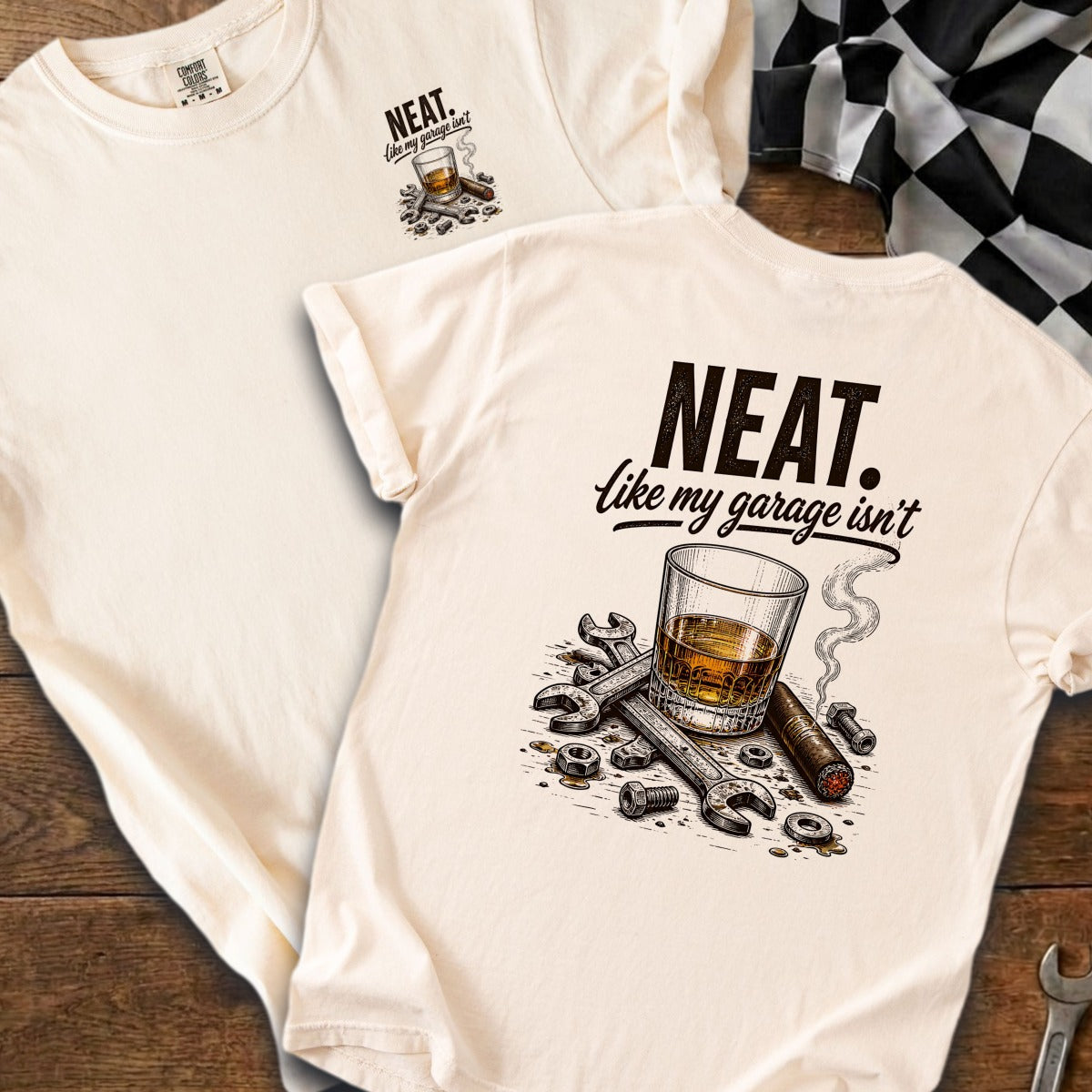 Cream t-shirts feature text and graphics of a cigar, whiskey, and tools.