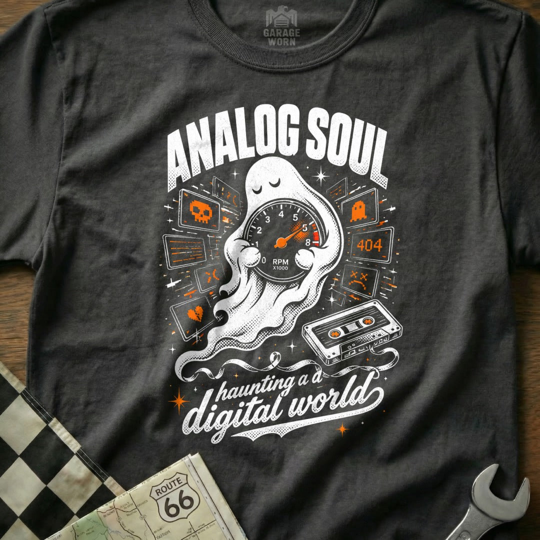 T-shirt graphic: ghost with tachometer, cassette, and digital icons, "Analog Soul" and "haunting a digital world".