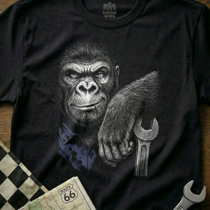 T-shirt graphic of a gorilla holding a wrench with a Route 66 map.