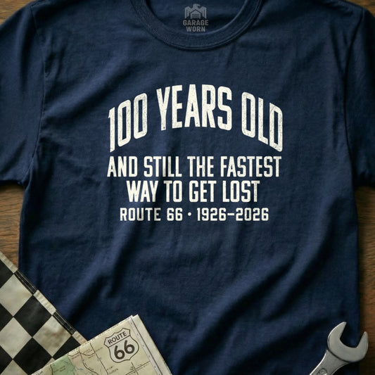 Navy t-shirt with "100 Years Old and Still the Fastest Way to Get Lost" and Route 66 details.