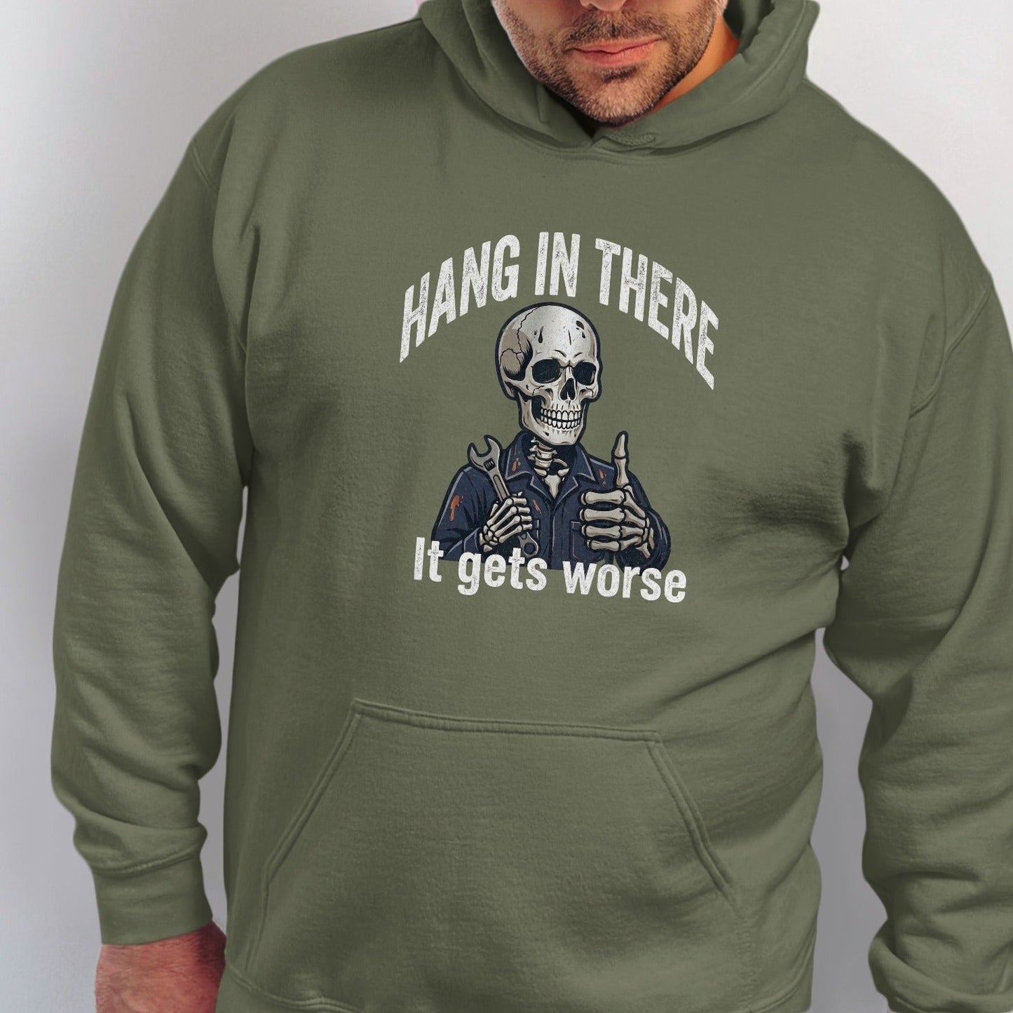 Skeleton mechanic giving a thumbs up with "Hang in there. It gets worse" text.