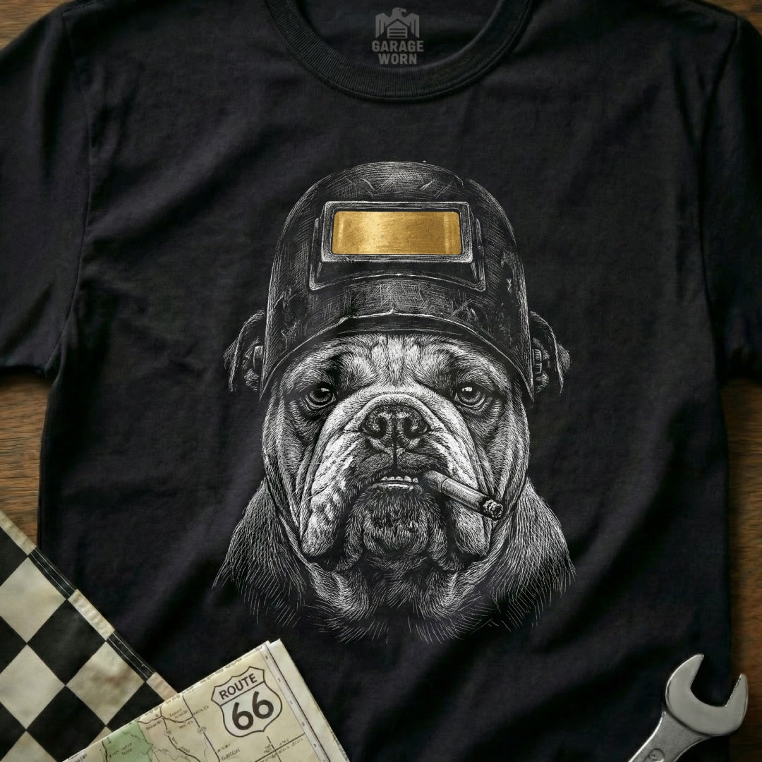 Bulldog wearing a welding mask and smoking a cigar.