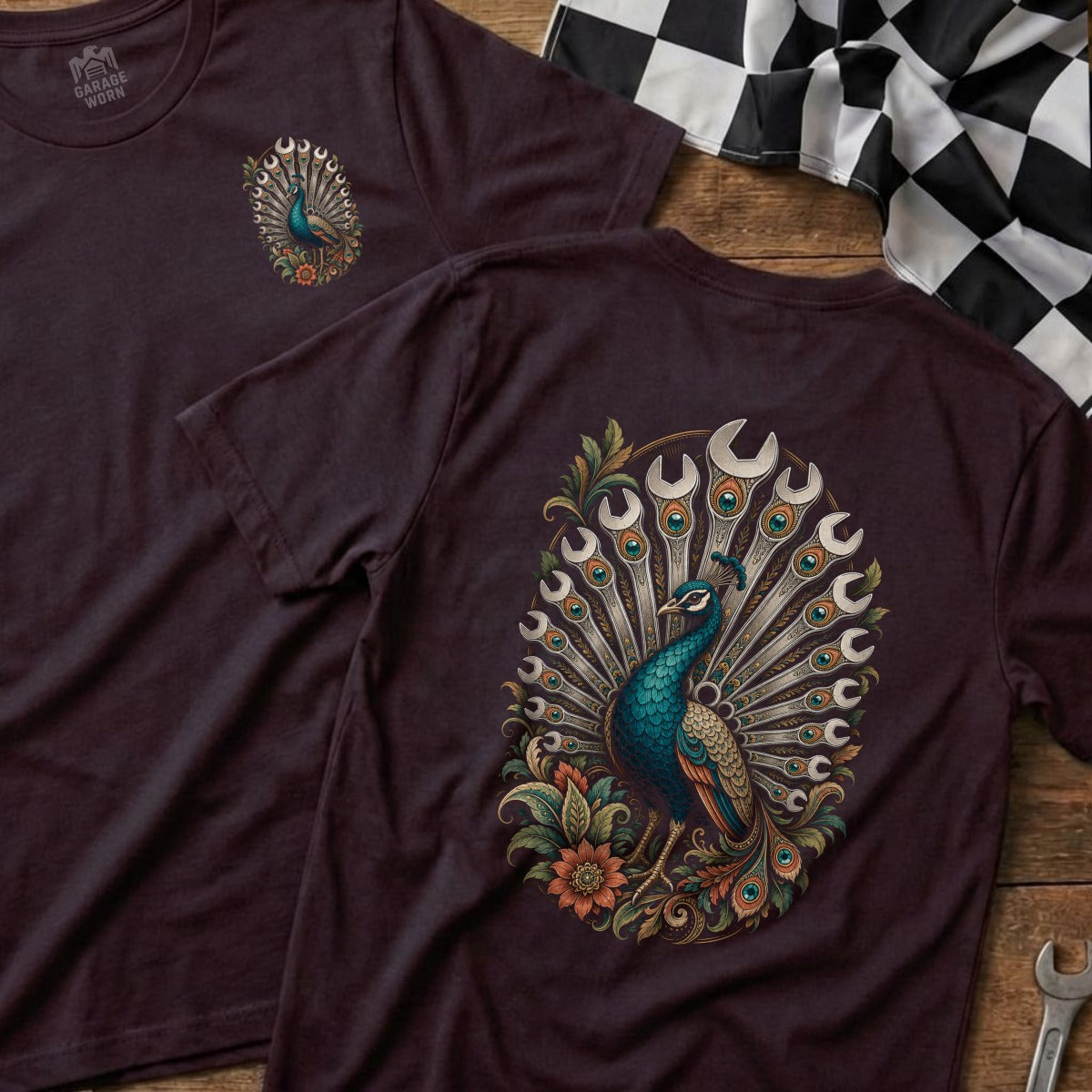 T-shirt with a peacock graphic featuring wrenches incorporated into its tail feathers.