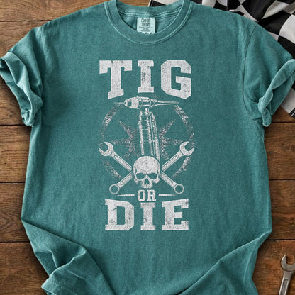 TIG OR DIE graphic tee with skull and welding equipment.