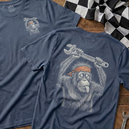 T-shirt with orangutan holding a wrench and sticking out its tongue.