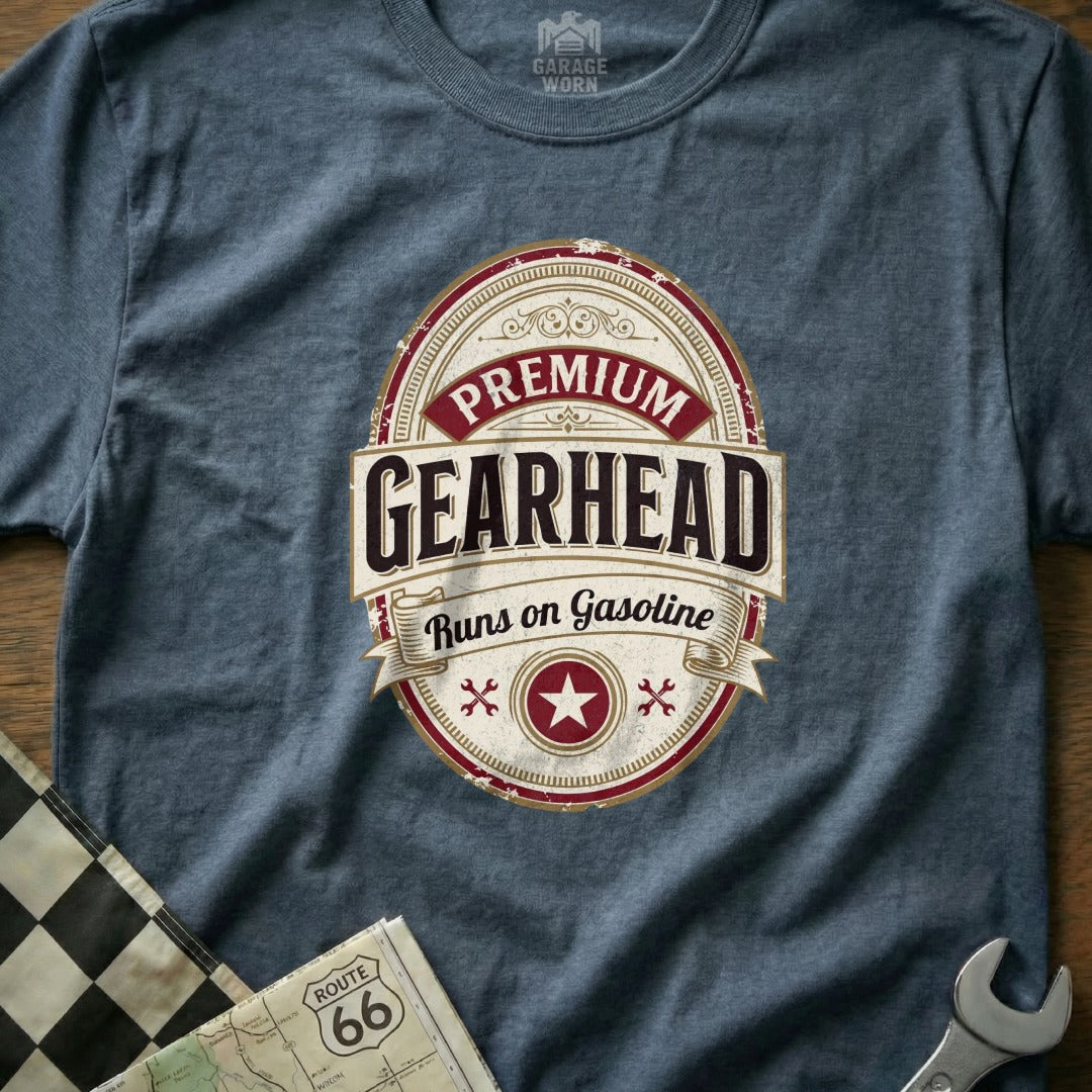 T-shirt with oval "Premium Gearhead Runs on Gasoline" graphic.