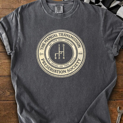 Manual Transmission Preservation Society t-shirt with gear shift graphic and text.