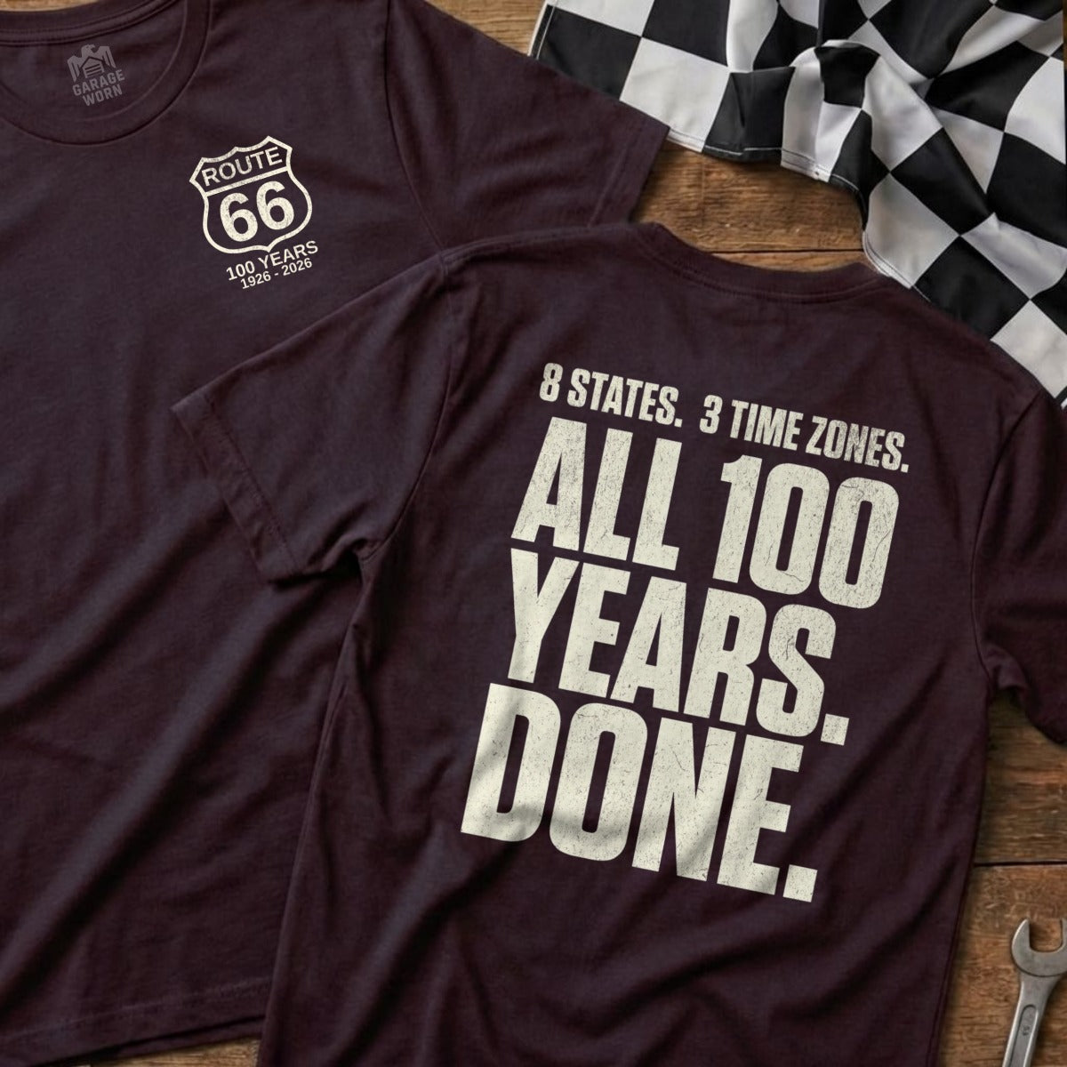Burgundy t-shirt with Route 66 logo and text "100 Years 1926-2026" on front, "8 States. 3 Time Zones. All 100 Years. Done." on back.