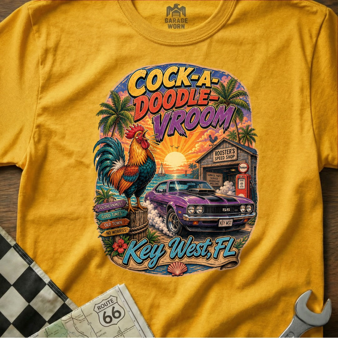 Yellow t-shirt with "Cock-a-Doodle Vroom Key West, FL" graphic and rooster.