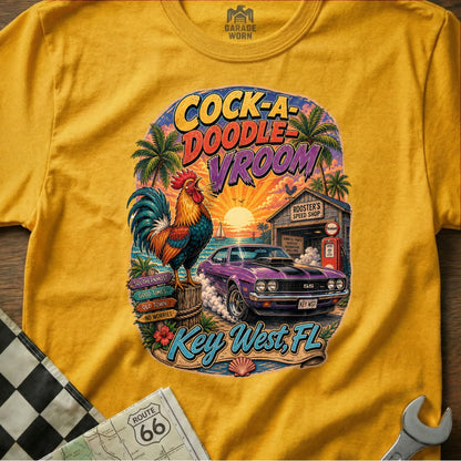 Yellow t-shirt with "Cock-a-Doodle Vroom Key West, FL" graphic and rooster.