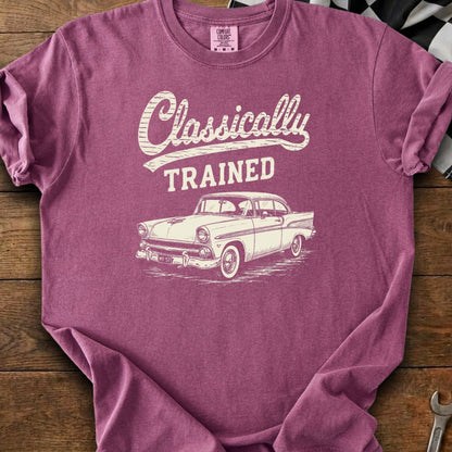 Maroon t-shirt with cream graphic of a classic car and text "Classically TRAINED".