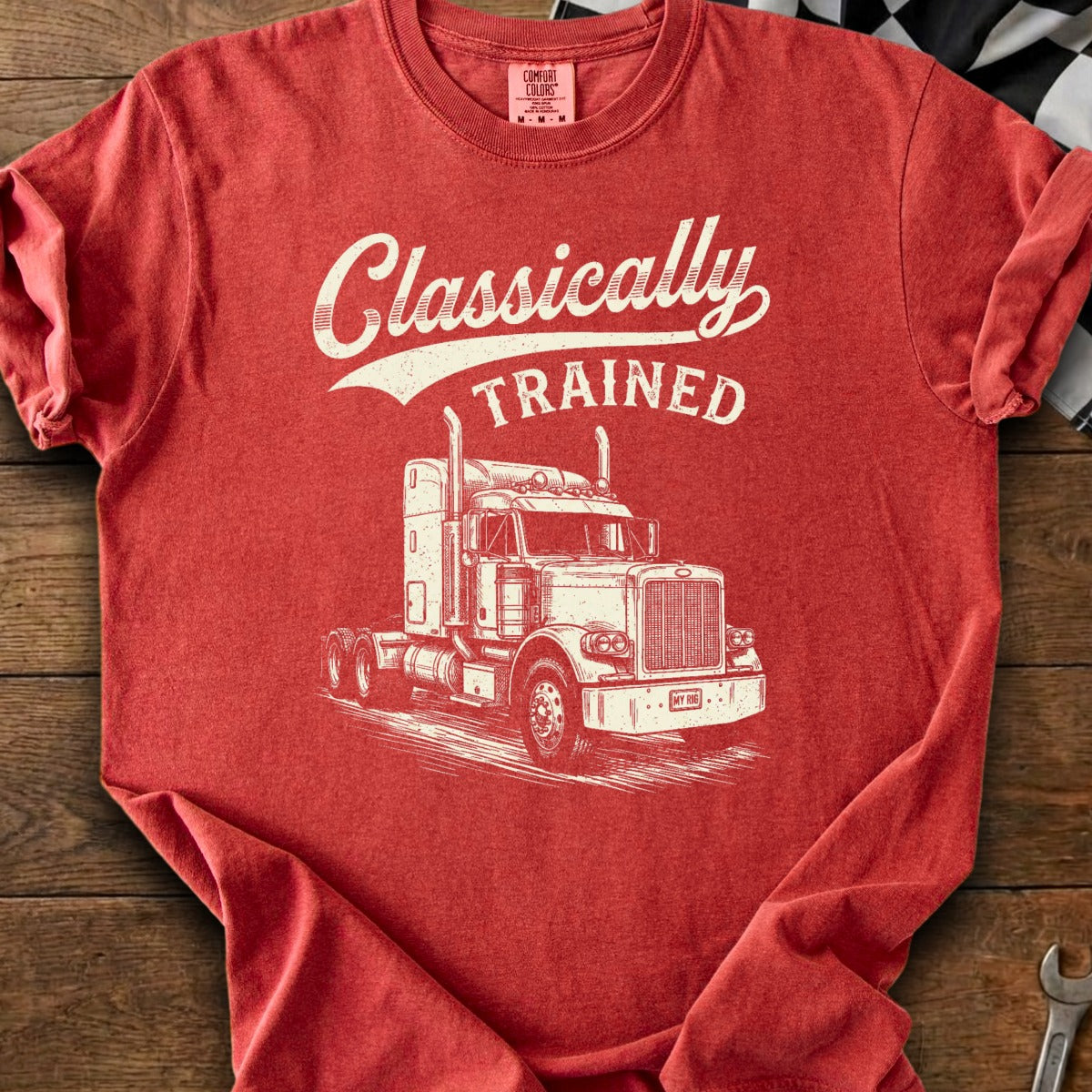 Red t-shirt with "Classically TRAINED" and a pen-and-ink drawing of a semi-truck.