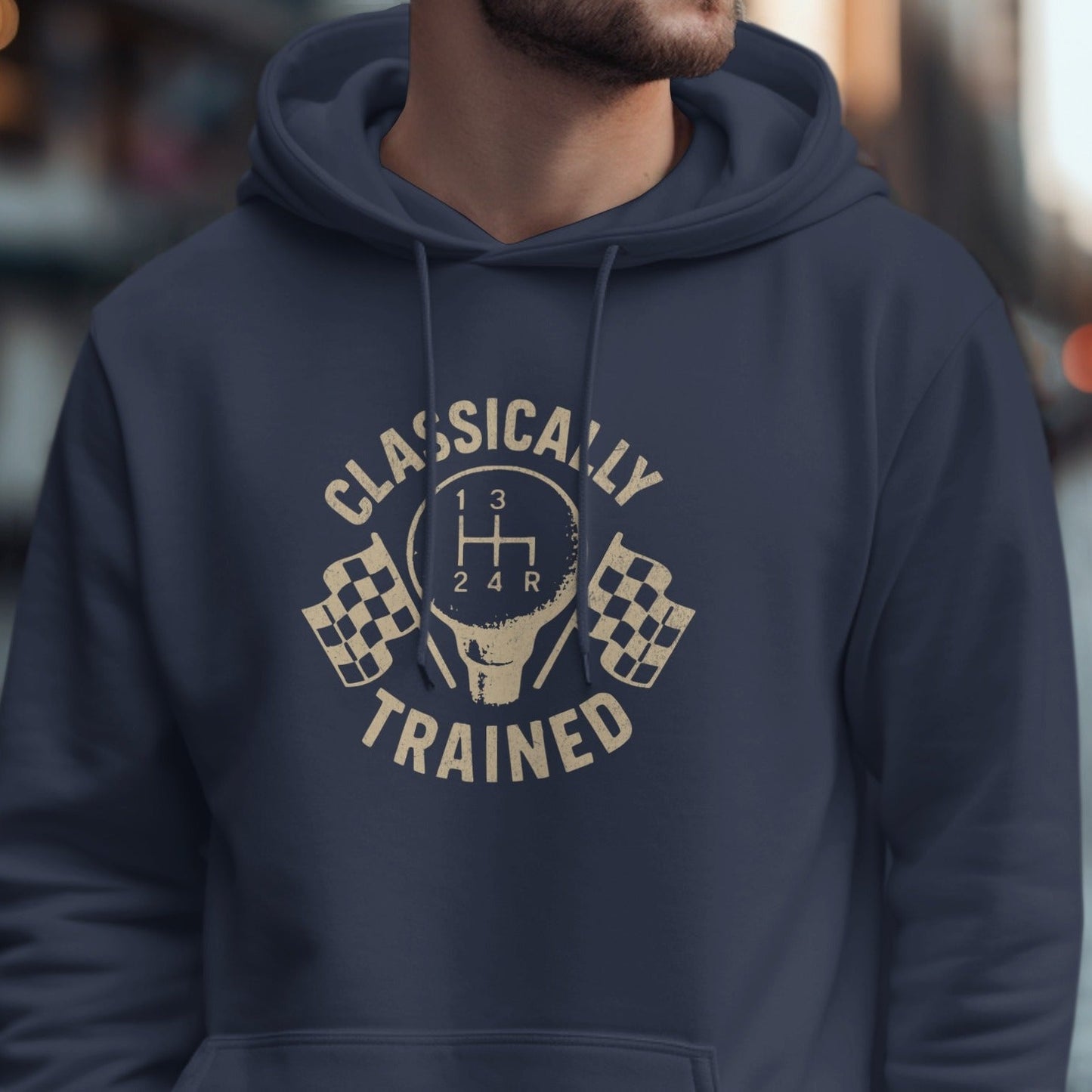 Navy hoodie with "Classically Trained" text and gear shift graphic.